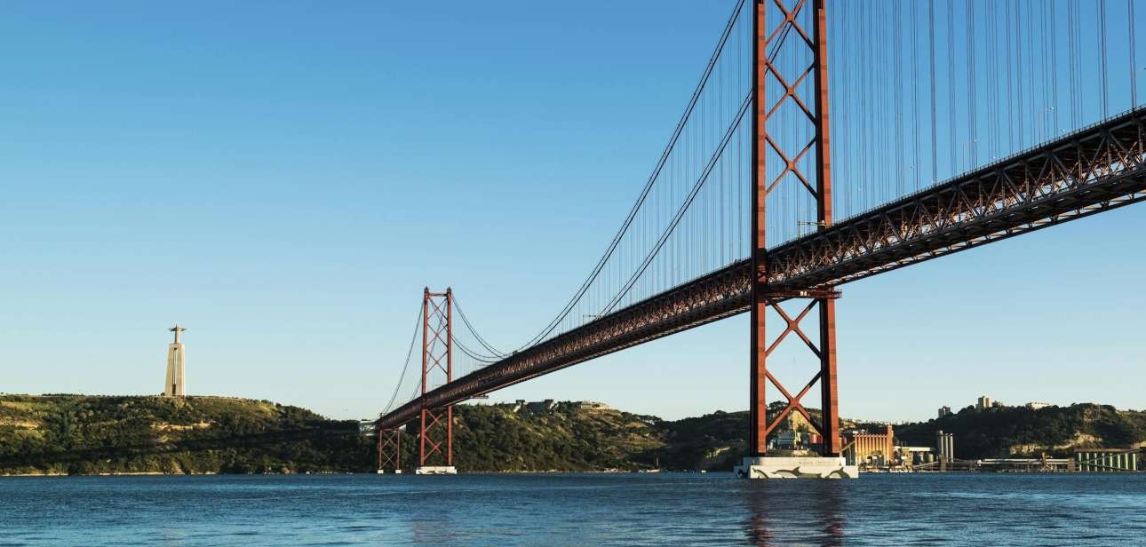 Explore the stunning architecture of the 25 de Abril Bridge spanning the Tagus River in Lisbon, Portugal.