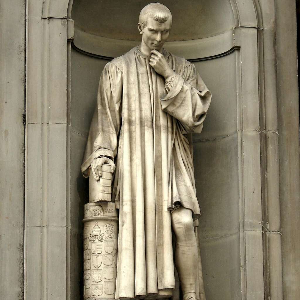 Intricate statue of Niccolò Machiavelli at the Uffizi Gallery in Florence, a masterpiece of Renaissance sculpture.