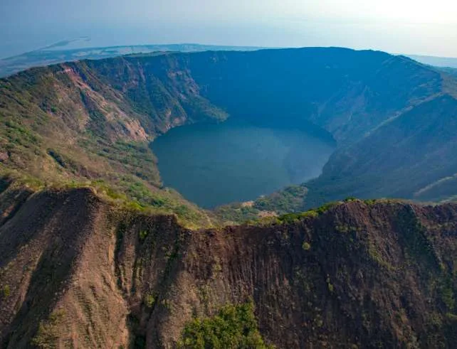 Stunning aerial view of Cosigüina Volcano's crater lake in Nicaragua, a natural wonder.