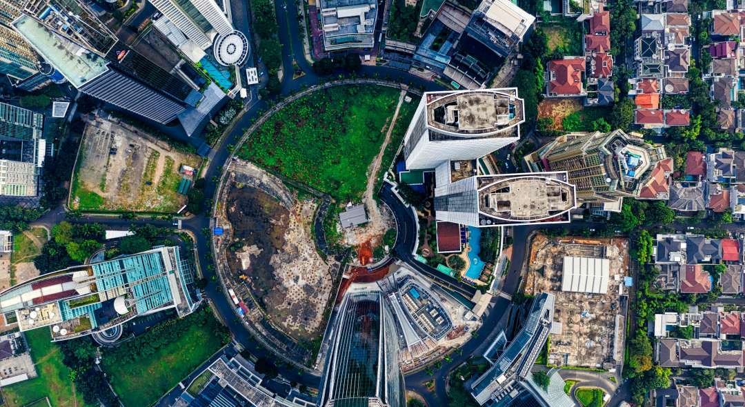 Stunning aerial view showcasing Jakarta's modern skyline and green spaces.