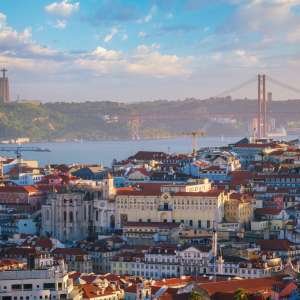 Sunset view of Lisbon from Miradouro da Senhora do Monte viewpoint. Lisbon, Portugal