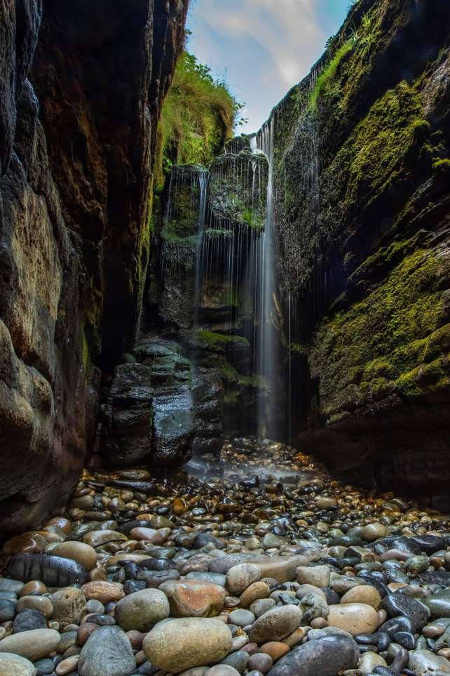 Vertical shot of Donegal's secret waterfall in the Republic of Ireland