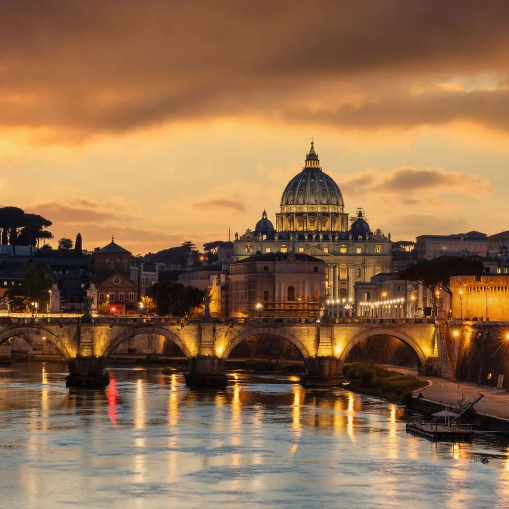 Rome Italy. San Pietro basilica in the Vatican, ponte Sant Angelo and Tiber river, sky at sunset