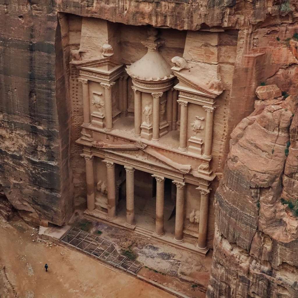Stunning aerial view of Al-Khazneh, Petra in Jordan, showcasing ancient architecture.