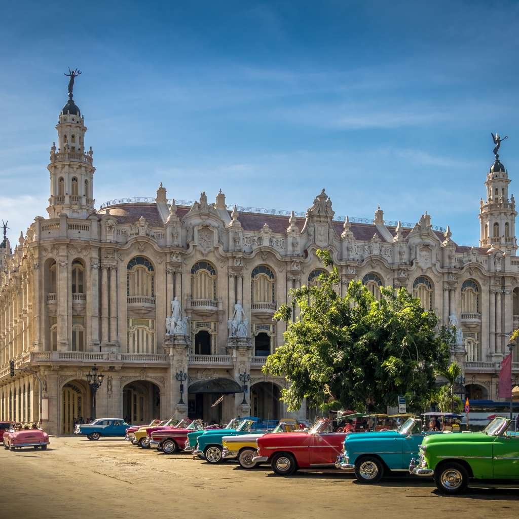 Cuban colorful vintage cars in front of the Gran Teatro - Havana, Cuba