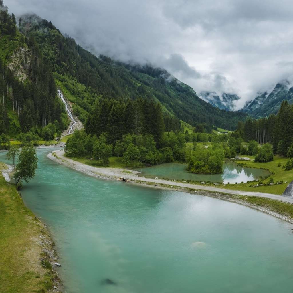 Panoramic aerial view of mountain wild river in Stubai Valley, Austria